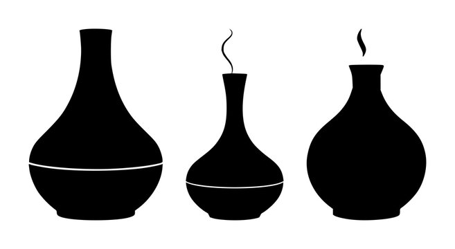 Aromatherapy oil diffuser set with solid black icon on white background featuring aromatherapy, oil, diffuser with wellness and relaxation