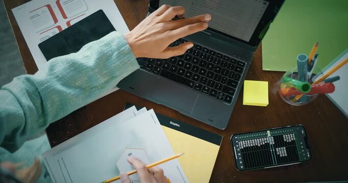 Creative Workspace with Laptop and Financial Planning