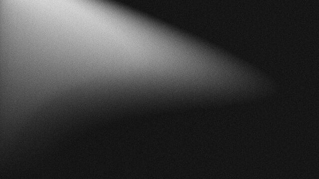 Black and white grainy gradient background with a diagonal light beam effect, monochrome abstract texture, ideal for dark mood designs, overlays, and minimalist projects.