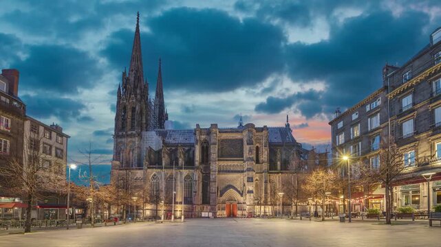 Clermont-Ferrand, France - view of Cathedral at dusk (static image with animated sky)