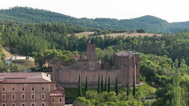 Historic medieval javier castle standing proudly on a hill. Beautiful lush green landscape surrounding the ancient fortress in navarre, spain