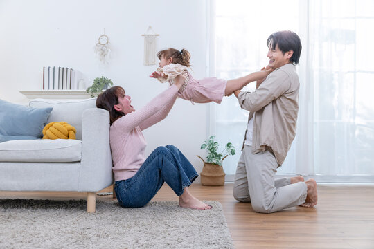 Family sharing joyful moments together in living room