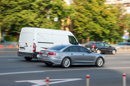 Ukraine, Kyiv - 16 July 2021: White Cadillac CTS car moving on the street. Editorial