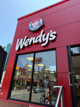 Niagara Falls, Ontario, Canada, June 14, 2025: Wendy's fast food restaurant exterior on Clifton Hill Niagara.