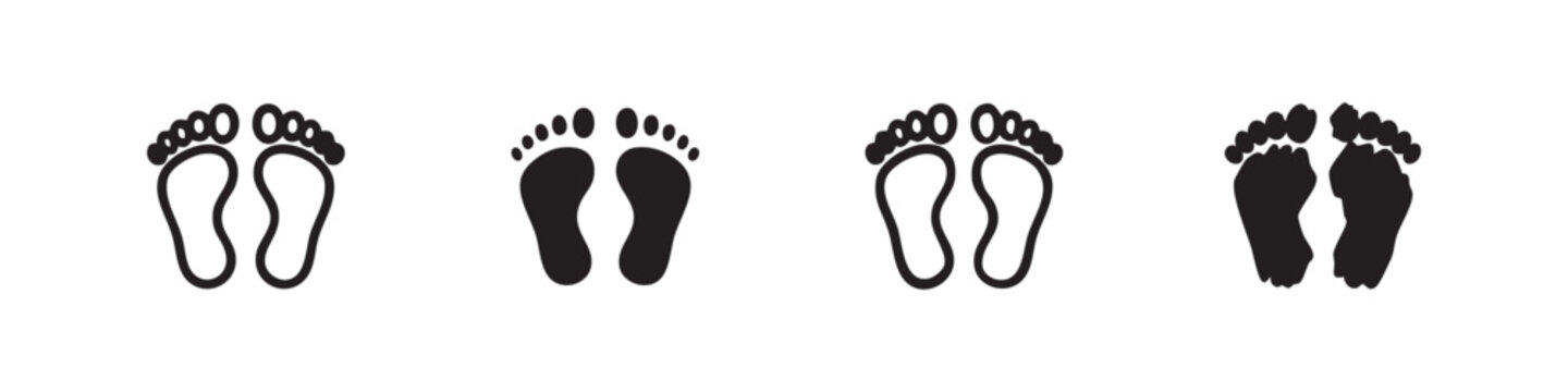 Set of four footprint icons, two outlined and two filled, on white
