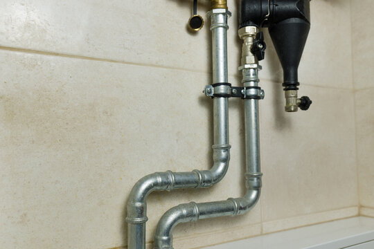 Pipes from the heat boiler to the underfloor heating tubes