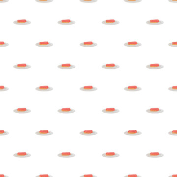 Ham rolls on plates forming a repeating deli meat pattern