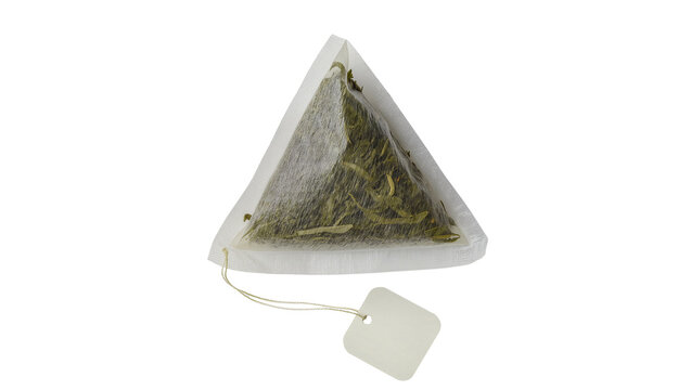 Triangular pyramid tea bag with loose green tea leaves and white tag, isolated on transparent background