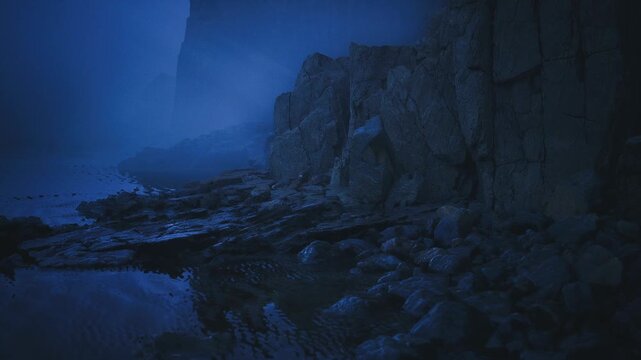 Low tide pools in deep blue light, rocky ledges cradle reflective water, granular filmlike grain and cool palette emphasize texture, stillness,