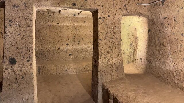 Damp Walls of an Etruscan Burial Chamber in Tufa