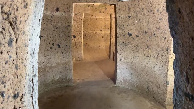 Interior View of a Stone Entrance Within a Tufa Chamber