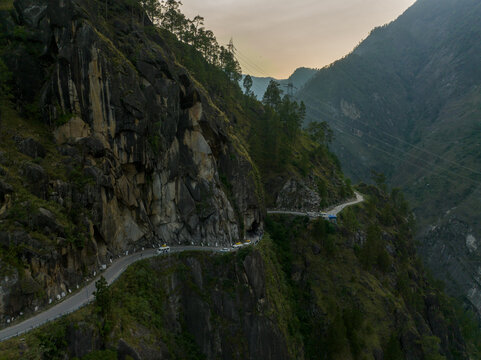 kinnaur mountain road drone view, dangerous curved road in himalayas india
aerial view spiti valley road, zigzag mountain road himachal pradesh
himalayas cliff road aerial, winding road through mounta