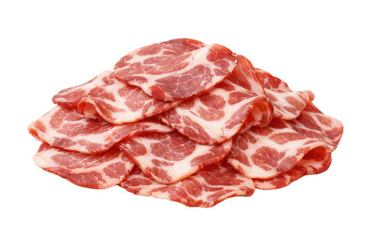 Thinly sliced raw pork shoulder, a pile of fresh capicola meat, uncooked marbled pork for charcuterie boards, gourmet Italian cuisine ingredient.