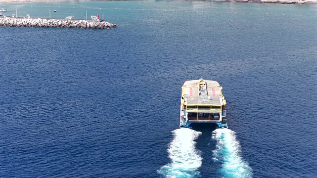 Aerial view of High-Speed Ferry Arriving in Los Cristainos in the South of Tenerife, Canary Islands