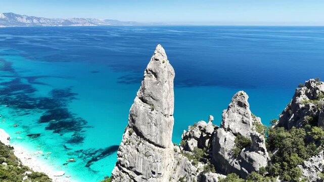 Aerial view of Cala Goloritz&egrave;, Baunei Coast, Sardinia, Italy. Iconic turquoise waters, white limestone cliffs adn pristine beach, often ranked among the most beautiful beaches in the world