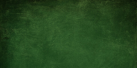 Fototapeta premium Deep green grunge texture background with distressed vintage border and weathered mottled paper effect surface. aged dark brown patterns on blank canvas material design for an old retro wall backdrop