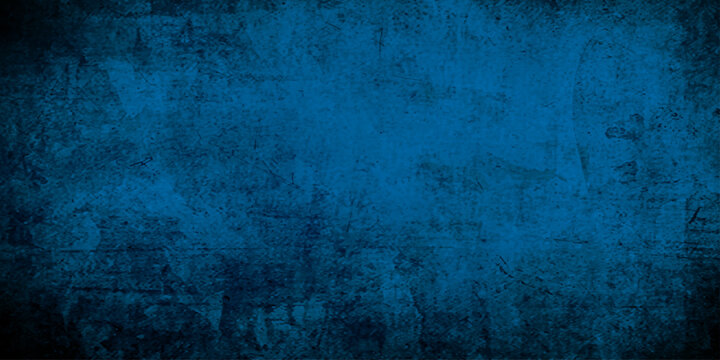 A dark vintage backdrop featuring an aged blue grunge texture on a rough wall surface with rusty antique paint and a weathered paper pattern design