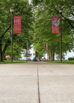 New Ulm, Minnesota: Martin Luther statue and central mall on Martin Luther College campus. MLC is a private liberal arts college operated by Wisconsin Evangelical Lutheran Synod.