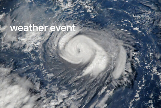A hurricane is swirling over the ocean.
