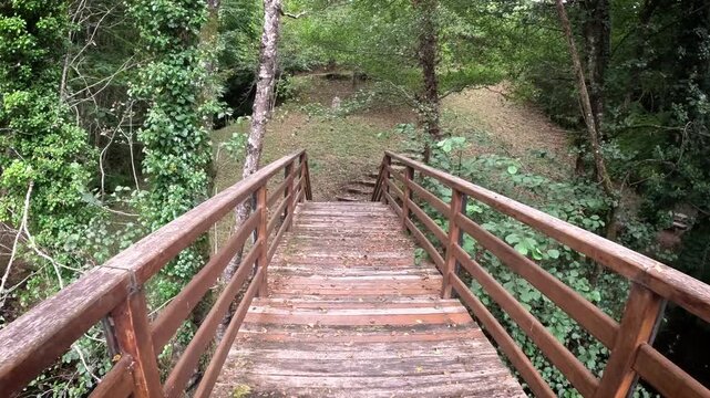 wooden bridge over Sarria river in Samos, comarca of Sarria, province of Lugo, Galicia, Spain