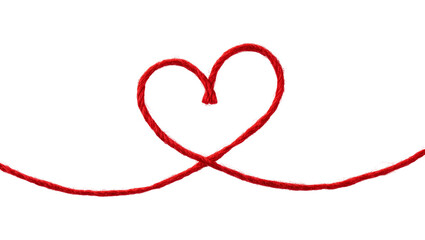 Red string forming a heart shape on a plain surface