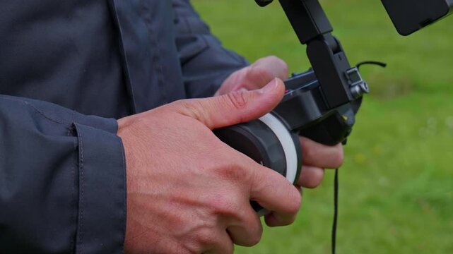 Focus Puller Using Wireless Remote Focus Controller on Professional Film Set