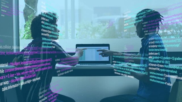 Two devs pointing at laptop while debugging, right dev initiating point, code overlay syncing point
