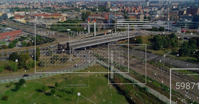 Showing overpass and rails crossing urban park displaying cars paved path data overlays