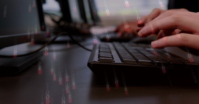 Typing hands tapping slim black keyboard at desk, with monitors, cables, binary overlay, copy space