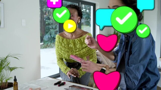 Host picking pink palette and brushing for makeup, woman smiling, icons growing and covering frame