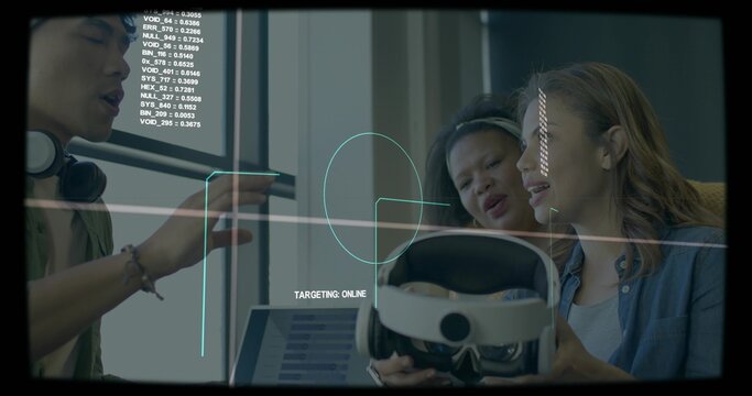 Testing VR headset, team at lab leaning, man gesturing with headphones HUD showing TARGETING ONLINE
