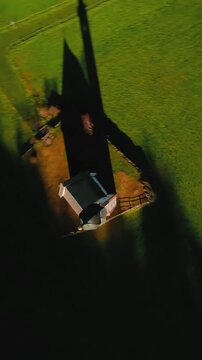 FPV Aerial view of the Church of St. Johann in Ranui at South Tyrol, Italy. 