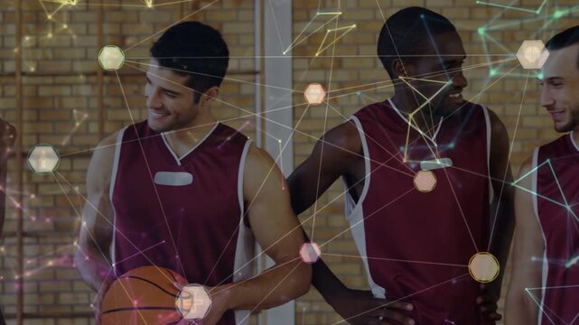 Three male basketball players fistbumping and chatting between plays, cradling ball, hex overlay