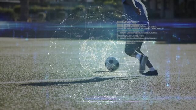 Male player dribbling tapping ball starting holo over legs, feinting past peer running sports drill