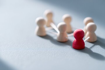 Obraz premium Red leader figure standing out from the crowd in a network. Teamwork, connection, and individuality business concept