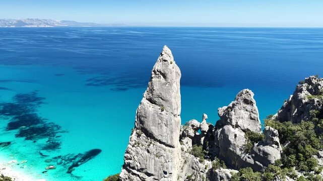 Aerial view of Cala Goloritz&egrave;, Baunei Coast, Sardinia, Italy. Iconic turquoise waters, white limestone cliffs adn pristine beach, often ranked among the most beautiful beaches in the world