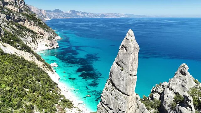 Aerial view of Cala Goloritz&egrave;, Baunei Coast, Sardinia, Italy. Iconic turquoise waters, white limestone cliffs adn pristine beach, often ranked among the most beautiful beaches in the world