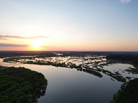 Aerial Sunset Over Flooded River Valley and Wetlands