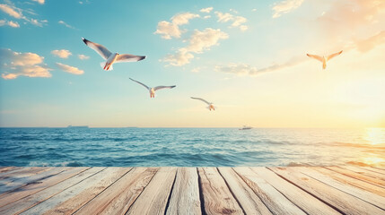 Fototapeta premium Tranquil seascape view from a wooden pier as seagulls soar against a backdrop of warm sunlight and gentle clouds over the serene ocean horizon at sunset.