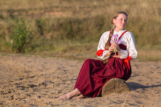 a woman in national Russian clothing