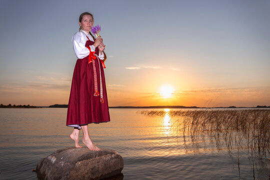 a woman in national Russian clothing