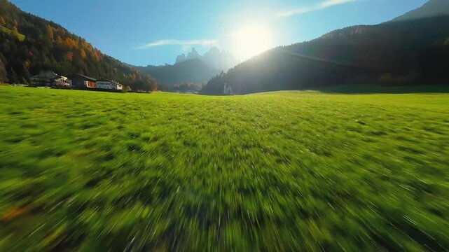 FPV Aerial view of the Church of St. Johann in Ranui at South Tyrol, Italy. 
