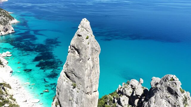 Aerial view of Cala Goloritz&egrave;, Baunei Coast, Sardinia, Italy. Iconic turquoise waters, white limestone cliffs adn pristine beach, often ranked among the most beautiful beaches in the world