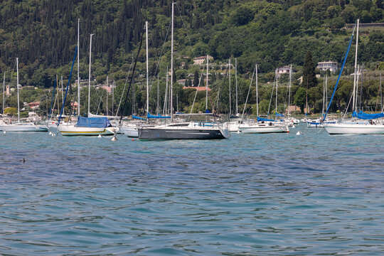  Yachts and motorboats moored in Bardolino on Lake Garda, Veneto, Italy