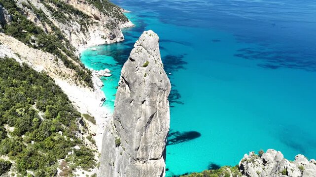 Aerial view of Cala Goloritz&egrave;, Baunei Coast, Sardinia, Italy. Iconic turquoise waters, white limestone cliffs adn pristine beach, often ranked among the most beautiful beaches in the world