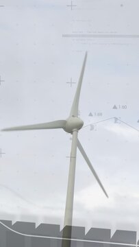 Vertical video: Wind driving turbine rotating right, UI rising and bars shifting showing output