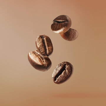 Flying roasted coffee beans isolated on beige background. Levitating aromatic arabica grains. Minimalist caffeine energy concept for espresso advertising.