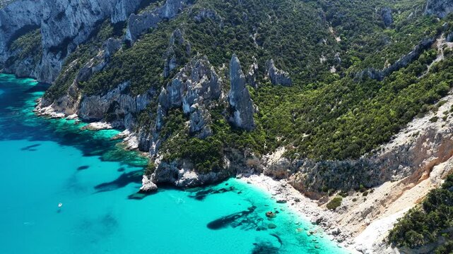 Aerial view of Cala Goloritz&egrave;, Baunei Coast, Sardinia, Italy. Iconic turquoise waters, white limestone cliffs adn pristine beach, often ranked among the most beautiful beaches in the world