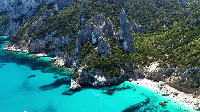 Aerial view of Cala Goloritz&egrave;, Baunei Coast, Sardinia, Italy. Iconic turquoise waters, white limestone cliffs adn pristine beach, often ranked among the most beautiful beaches in the world