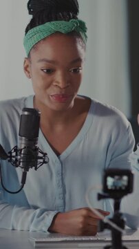 Podcaster recording setup, Professional home studio environment with focused presenter and camera view